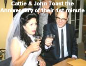 Cattie & John Toast the
Anniversary of their 1st minute